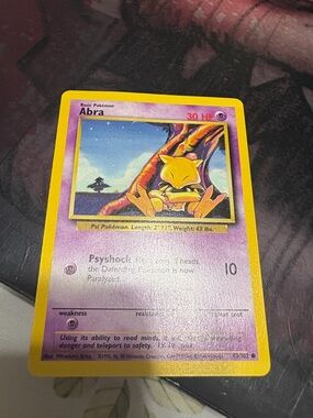 Abra Pokémon Card - Yellow & Purple